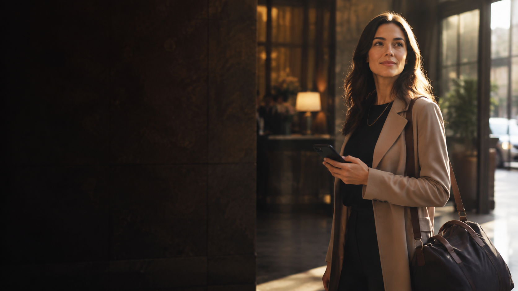 A traveler arriving in a refined hospitality setting